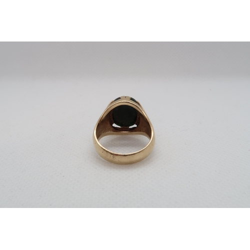 174 - A 9ct yellow gold (hallmarked) bloodstone ring size Q - approx weight 8.7 grams