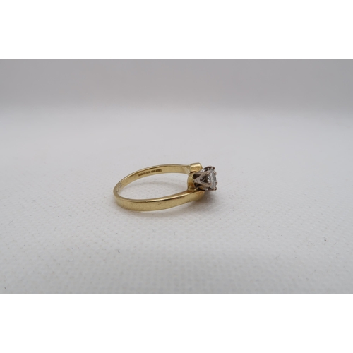 181 - An 18ct yellow gold (hallmarked) three stone diamond ring -total round brilliant cut diamond weight ... 