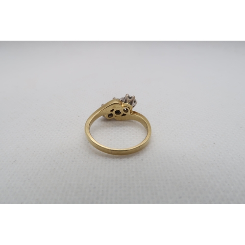 181 - An 18ct yellow gold (hallmarked) three stone diamond ring -total round brilliant cut diamond weight ... 