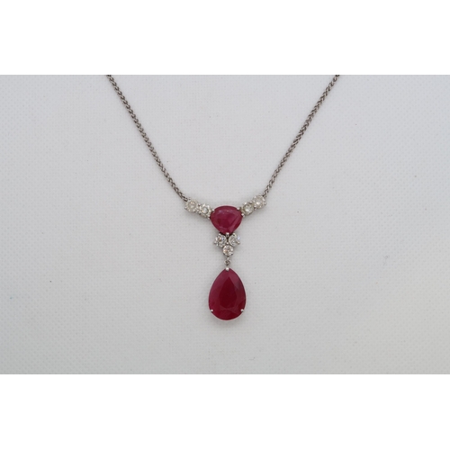 192 - A 9ct white gold (hallmarked) diamond and ruby drop necklace - total diamond weight approx 1.7ct - t... 