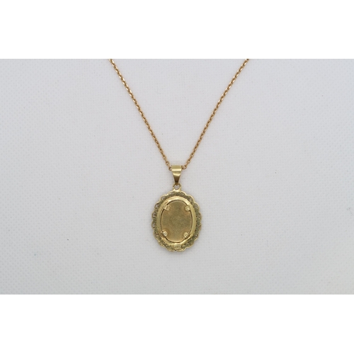 197 - An 18ct yellow gold (hallmarked) pendant on chain - oval pendant with miniature portrait 2.5cm exclu... 