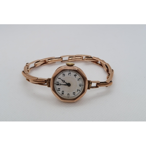 249 - A 9ct (hallmarked) rose gold cased ladies wristwatch bracelet strap marked 'Acc 9c Albion' total wei... 