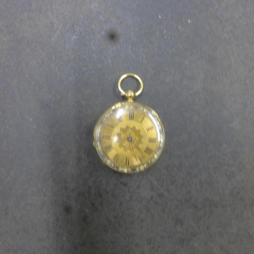 251 - An 18ct yellow gold (hallmarked) cased fob watch, finely chased case approx 3.5cm - approx weight 33... 