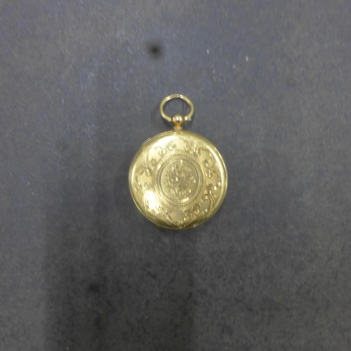 251 - An 18ct yellow gold (hallmarked) cased fob watch, finely chased case approx 3.5cm - approx weight 33... 