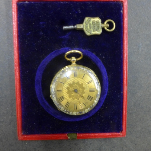 251 - An 18ct yellow gold (hallmarked) cased fob watch, finely chased case approx 3.5cm - approx weight 33... 