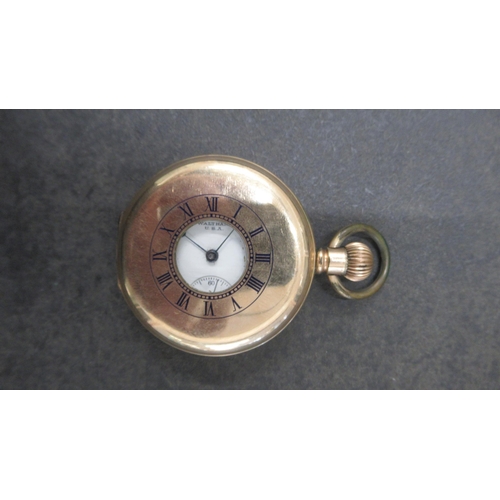 252 - A Waltham gold plated half hunter pocket watch - case approx 5cm - working in the saleroom