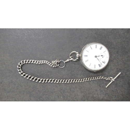 260 - A silver Waltham double cased pocket watch with hallmarked silver chain and T-bar