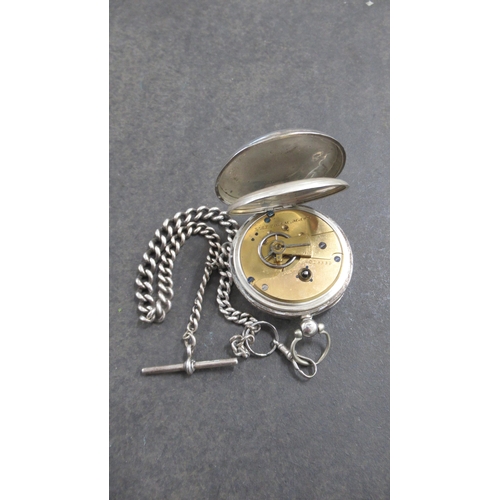 260 - A silver Waltham double cased pocket watch with hallmarked silver chain and T-bar