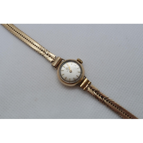 263 - A 9ct yellow gold (hallmarked) Cyma ladies bracelet watch - 16mm round case - with 9ct (hallmarked) ... 