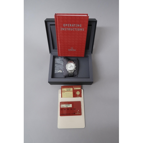 265 - An Omega Speedmaster date, 2006 ref. 3513.30.00 with papers and a Watchfinder box - working in the s... 