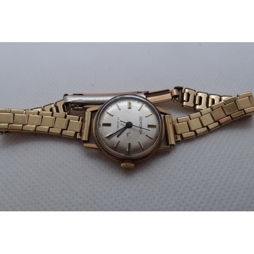 270 - A 9ct yellow gold (hallmarked) cased ladies Skonda wristwatch with plated bracelet - case 22mm