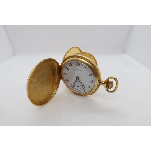 277 - A gold plated Summit pocket watch - 4.5cm - working in the saleroom