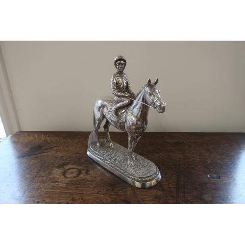 296 - A silver filled figure of a horse and jockey hallmarked Sheffield 1987 and inscribed Sheldon - appro... 