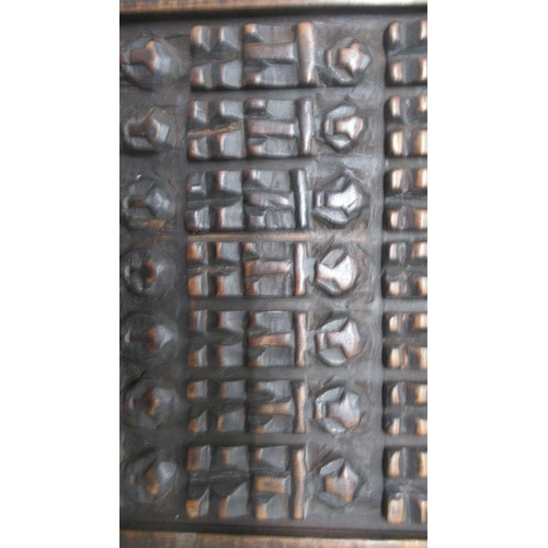 355 - A Mali Dogon carved wood panel - 71cm x 27cm