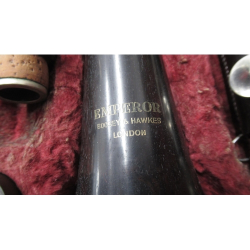 370 - A Boosey & Hawkes clarinet in fitted leather case, complete with accessories