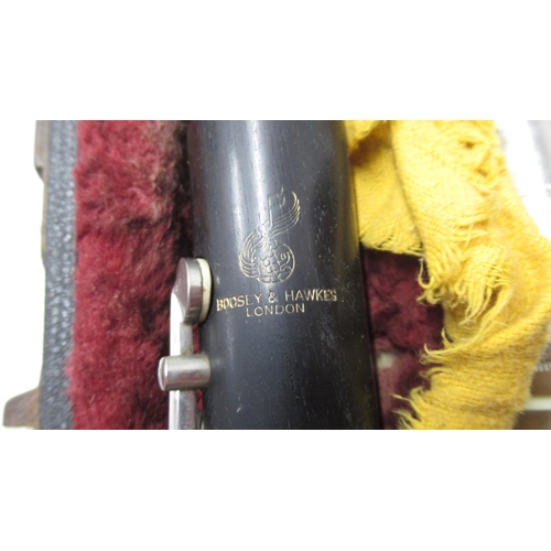 370 - A Boosey & Hawkes clarinet in fitted leather case, complete with accessories