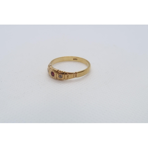 47 - An 18ct yellow gold (hallmarked) ring with diamonds and ruby - ring size V - approx weight 4.6 grams