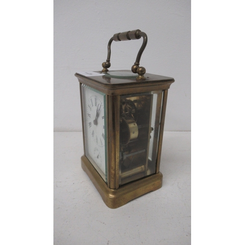 500 - A crass cased four glass carriage clock - 10.5cm - good overall condition - with alarm sub-dial and ... 