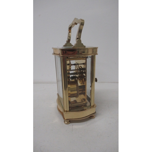 501 - An Asprey serpentine case brass carriage clock with hand painted dial - working, with key - approx h... 