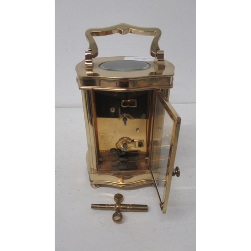 501 - An Asprey serpentine case brass carriage clock with hand painted dial - working, with key - approx h... 