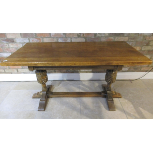 509 - A 1940's oak dining table - 152cm x 75cm - in good condition