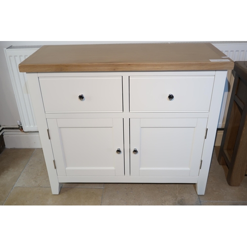 536 - Winchester 2 drawer 2 door sideboard. Painted white. Ex display. H86cm. Top 100 x 40cm.