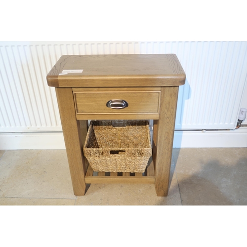 537 - Canterbury oak console table & 1 basket. Ex display

– Solid Wood Frame
– Magazine Shelf with Wicker... 