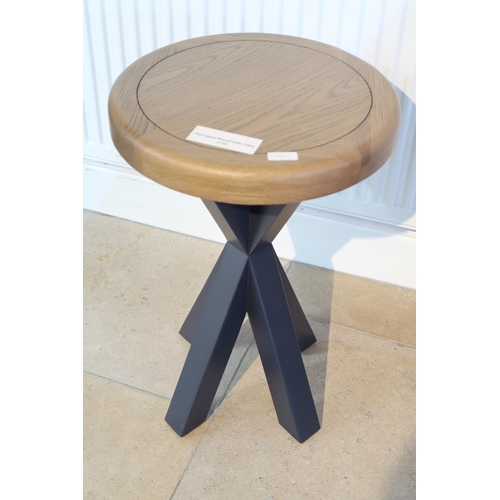 547 - Harrogate round side table. Painted blue with oak top finish. Ex display

Solid Wood Frame
Cross Tri... 