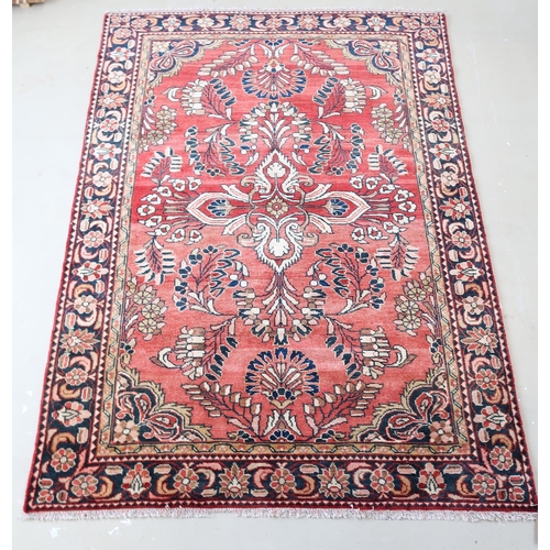 589 - A Lillihan hand knotted woollen rug - 2.10m x 1.53m