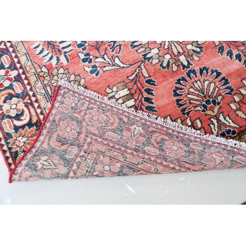 589 - A Lillihan hand knotted woollen rug - 2.10m x 1.53m