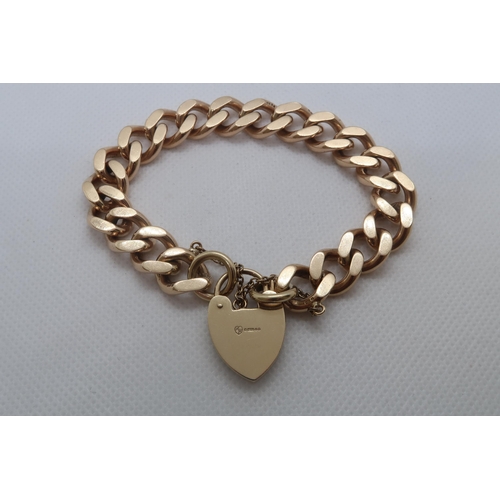 59 - A 9ct yellow gold (hallmarked) albert link bracelet with heart lock - 48.5 grams