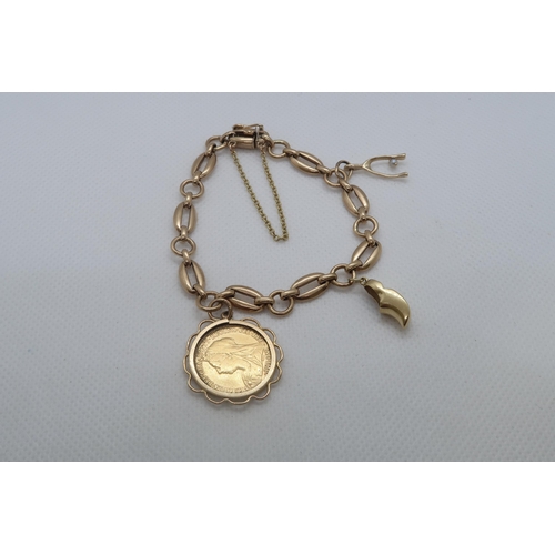 61 - A 9ct yellow gold (hallmarked) bracelet with two charms and a mounted 1895 half sovereign - total we... 