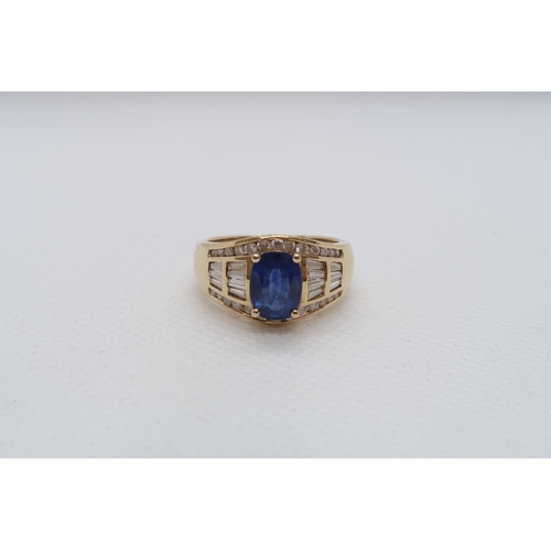 62 - A good sapphire and diamond ring - The central oval sapphire approx 8mmm x 6mm with 14 baguette cut ... 