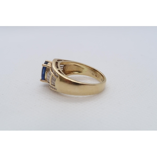 62 - A good sapphire and diamond ring - The central oval sapphire approx 8mmm x 6mm with 14 baguette cut ... 