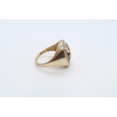 75 - A 9ct yellow gold (hallmarked) mans ring with diamonds - ring size Z -approx weight 8.4 grams