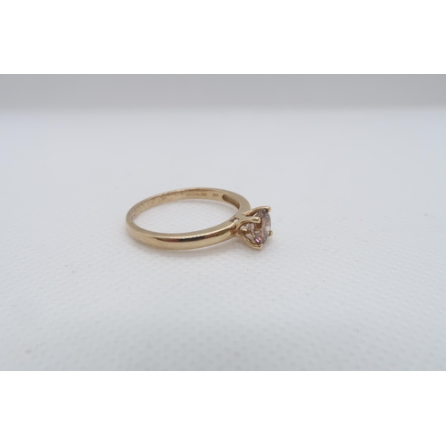 80 - A 9ct yellow gold (hallmarked) Cognac coloured diamond solitaire ring - The round brilliant cut diam... 