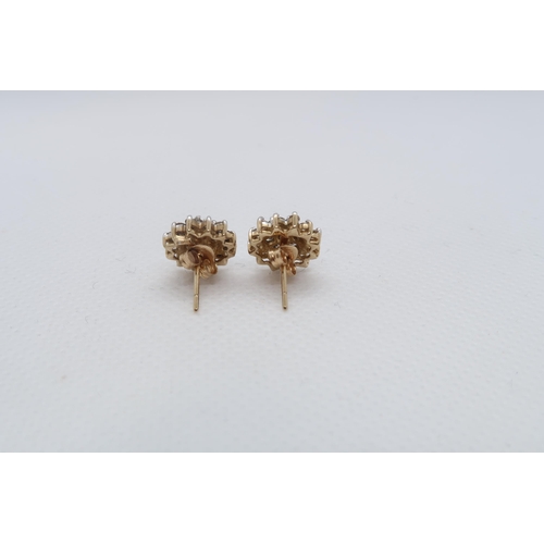 87 - A pair of 9ct yellow gold (hallmarked) diamond cluster ear studs - approx 11mm - approx weight 2.3 g... 