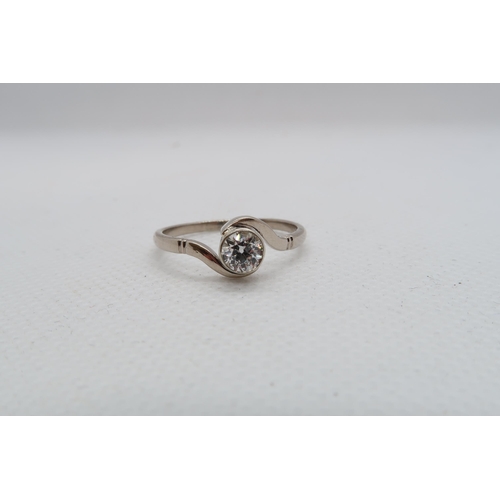 94 - A platinum and diamond ring - diamond approx 0.5ct, colour approx G/H, clarity VS1 - ring size O