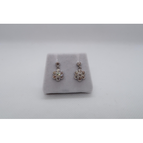 99 - A pair of 18ct white gold daisy style diamond set cluster drop earrings, boxed - round brilliant cut... 