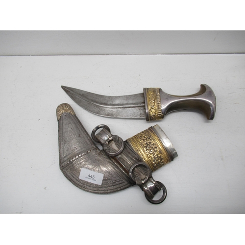 446 - A silver and gilt mounted Omani Khanjar dagger with horn handle - good overall condition, curved bla... 