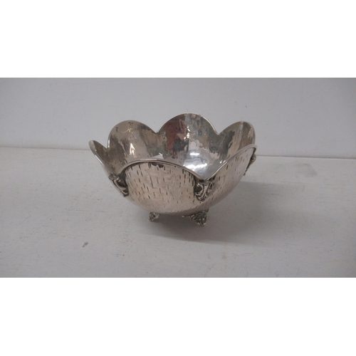 301 - A Continental .800 silver bowl set on three feet - Diameter 13cm - good overall condition - approx w... 