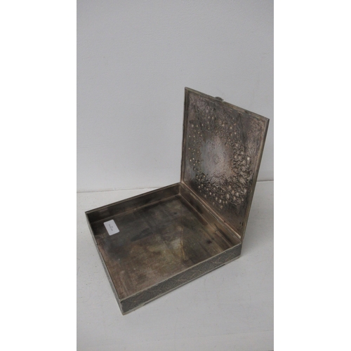 305 - An Eastern silver desk box with finely chased decoration - 18cm x 18cm x 3cm - good overall conditio... 