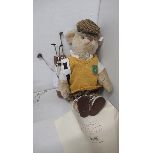 456B - A Steiff Golfer teddy bear in bag with golf bag and clubs