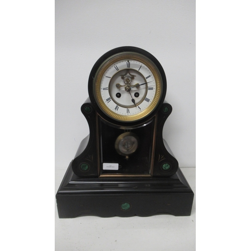 530 - An antique slate marble clock with veined green marble inset roundels, strikes on the half and the h... 