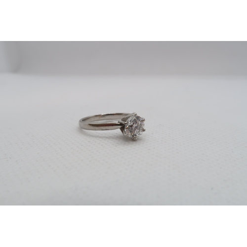 1A - A classic diamond solitaire ring with accompanying AGI certificate - The round brilliant cut diamond... 