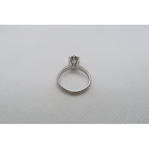 1A - A classic diamond solitaire ring with accompanying AGI certificate - The round brilliant cut diamond... 