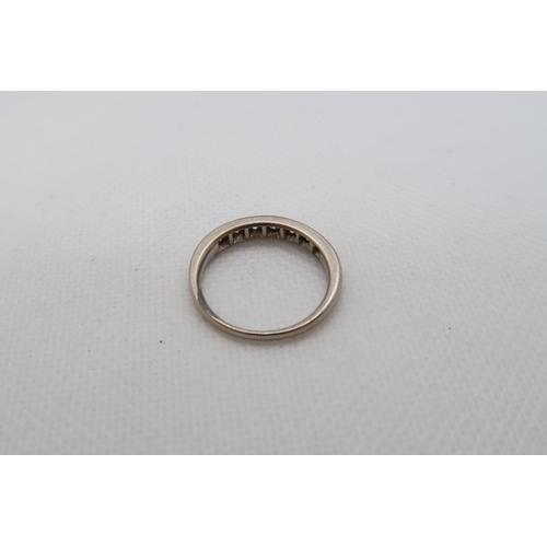 204 - An approx 18ct (Tested) white gold diamond half eternity ring size P/Q - approx weight 4.1 grams