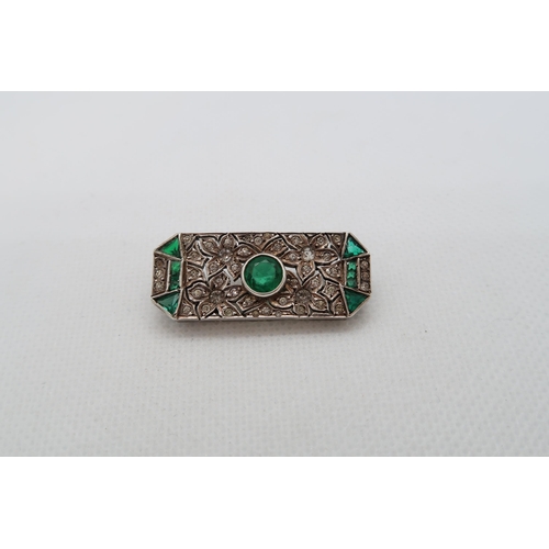 209 - An Art Deco Continental silver brooch with green and white glass - 3.5cm x 1.5cm