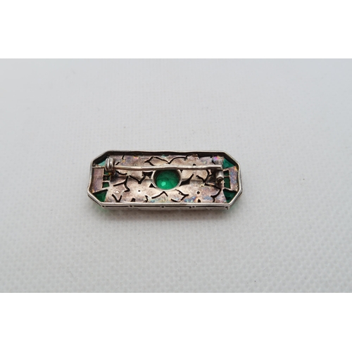 209 - An Art Deco Continental silver brooch with green and white glass - 3.5cm x 1.5cm