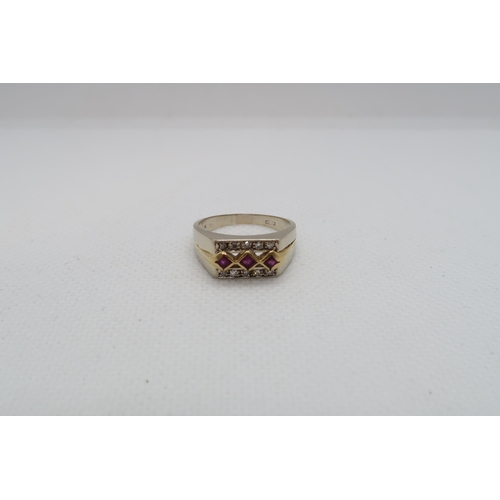 211 - An 18ct (hallmarked) bi colour ring with rubies and diamonds - ring size O/P - weight approx 5.3 gra... 